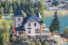 Гостиница Hotel Schloesschen am See  Курон Веноста